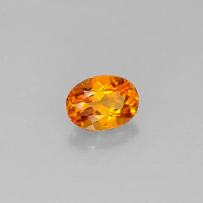 0.44 ct Orange Clinohumite Stone, Natural Clinohumite in Oval Facet Shape for Sale