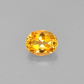 0.56 ct Yellow Clinohumite Gemstone, Clinohumite Gem in Oval Facet Shape for Sale.
