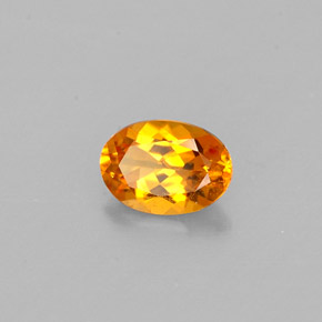 0.47 ct Orange Clinohumite Stone, Natural Clinohumite in Oval Facet Shape for Sale