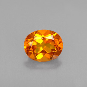 0.48 ct Orange Clinohumite Gemstone, Clinohumite Gem in Oval Facet Shape for Sale.
