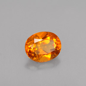 0.48 ct Orange Clinohumite Stone, Natural Clinohumite in Oval Facet Shape for Sale