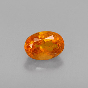 0.52 ct Orange Clinohumite Gemstone, Clinohumite Gem in Oval Facet Shape for Sale.