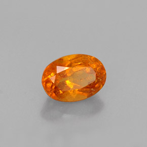 0.52 ct Orange Clinohumite Stone, Natural Clinohumite in Oval Facet Shape for Sale