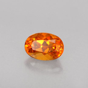 0.45 ct Orange Clinohumite Stone, Natural Clinohumite in Oval Facet Shape for Sale