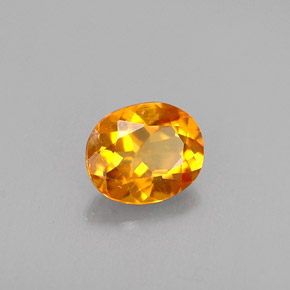 0.41 ct Orange Clinohumite Stone, Natural Clinohumite in Oval Facet Shape for Sale