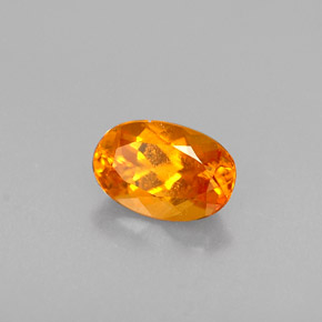 0.47 ct Orange Clinohumite Stone, Natural Clinohumite in Oval Facet Shape for Sale