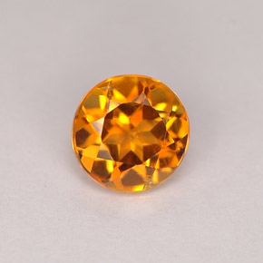 0.71 ct Orange Clinohumite Gemstone, Clinohumite Gem in Round Facet Shape for Sale.