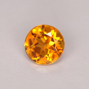 0.71 ct Orange Clinohumite Stone, Natural Clinohumite in Round Facet Shape for Sale