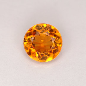 0.68 ct Orange Clinohumite Gemstone, Clinohumite Gem in Round Facet Shape for Sale.