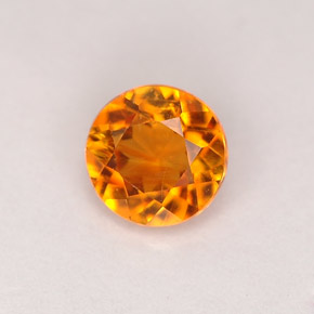 0.68 ct Orange Clinohumite Stone, Natural Clinohumite in Round Facet Shape for Sale