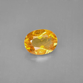 1.68 ct Orange Clinohumite Gemstone, Clinohumite Gem in Oval Facet Shape for Sale.