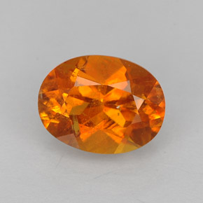 1.43 ct Orange Clinohumite Gemstone, Clinohumite Gem in Oval Facet Shape for Sale.