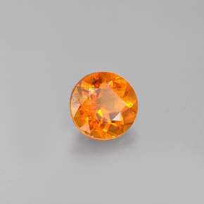 0.77 ct Orange Clinohumite Stone, Natural Clinohumite in Round Facet Shape for Sale