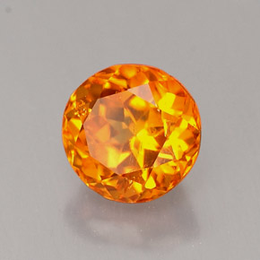0.89 ct Orange Clinohumite Stone, Natural Clinohumite in Round Facet Shape for Sale