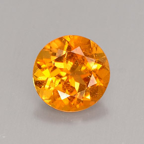0.62 ct Orange Clinohumite Gemstone, Clinohumite Gem in Round Facet Shape for Sale.