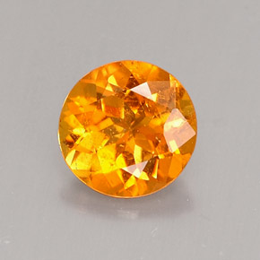 0.62 ct Orange Clinohumite Stone, Natural Clinohumite in Round Facet Shape for Sale