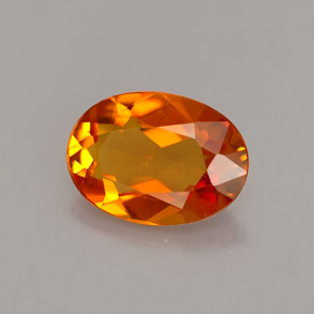 1.23 ct Orange Clinohumite Gemstone, Clinohumite Gem in Oval Facet Shape for Sale.