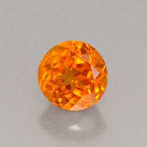 0.80 ct Orange Clinohumite Gemstone, Clinohumite Gem in Round Facet Shape for Sale.