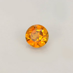 0.52 ct Orange Clinohumite Stone, Natural Clinohumite in Round Facet Shape for Sale