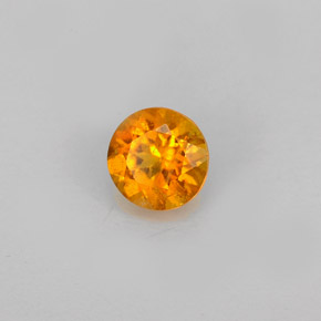 0.60 ct Orange Clinohumite Stone, Natural Clinohumite in Round Facet Shape for Sale