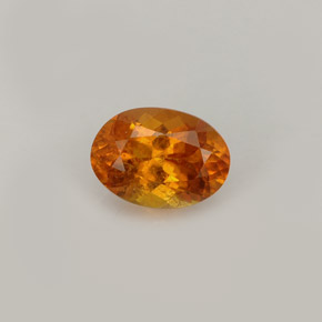 0.93 ct Orange Clinohumite Gemstone, Clinohumite Gem in Oval Facet Shape for Sale.