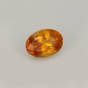 0.93 ct Orange Clinohumite Stone, Natural Clinohumite in Oval Facet Shape for Sale