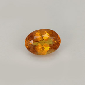 0.77 ct Orange Clinohumite Gemstone, Clinohumite Gem in Oval Facet Shape for Sale.