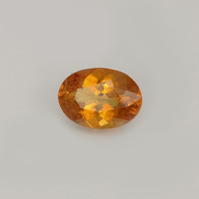 0.77 ct Orange Clinohumite Stone, Natural Clinohumite in Oval Facet Shape for Sale