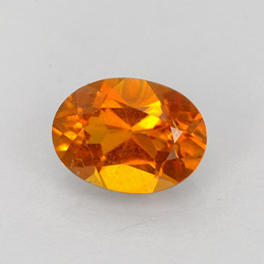 0.84 ct Orange Clinohumite Gemstone, Clinohumite Gem in Oval Facet Shape for Sale.