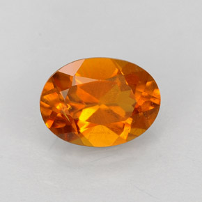 0.84 ct Orange Clinohumite Stone, Natural Clinohumite in Oval Facet Shape for Sale