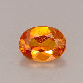 0.53 ct Orange Clinohumite Gemstone, Clinohumite Gem in Oval Facet Shape for Sale.