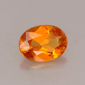 0.53 ct Orange Clinohumite Stone, Natural Clinohumite in Oval Facet Shape for Sale