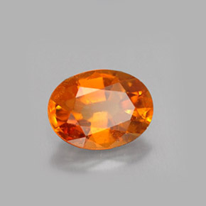 1.47 ct Orange Clinohumite Gemstone, Clinohumite Gem in Oval Facet Shape for Sale.