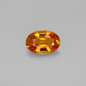 0.93 ct Orange Clinohumite Gemstone, Clinohumite Gem in Oval Facet Shape for Sale.