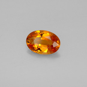 0.93 ct Orange Clinohumite Stone, Natural Clinohumite in Oval Facet Shape for Sale