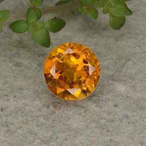 0.6ct Round Facet Yellow Orange Clinohumite for sale thumb image of 0.6ct Round Facet Yellow Orange Clinohumite (ID: 494985)