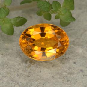 0.84 ct Orange Clinohumite Gemstone, Clinohumite Gem in Oval Facet Shape for Sale.