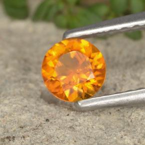 0.38 ct Orange Clinohumite Stone, Natural Clinohumite in Round Facet Shape for Sale