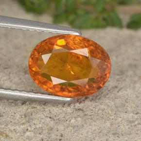 2.34 ct Orange Clinohumite Gemstone, Clinohumite Gem in Oval Facet Shape for Sale.