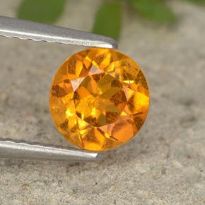 0.9ct Round Facet Yellow Orange Clinohumite for sale thumb image of 0.9ct Round Facet Yellow Orange Clinohumite (ID: 495110)