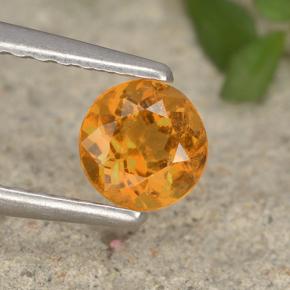 0.5ct Round Facet Yellow Orange Clinohumite for sale thumb image of 0.5ct Round Facet Yellow Orange Clinohumite (ID: 495175)