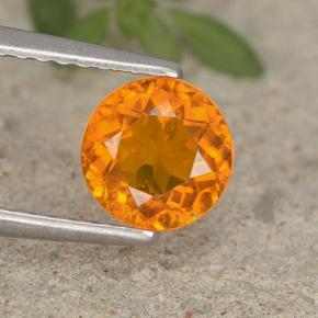 0.95 ct Orange Clinohumite Gemstone, Clinohumite Gem in Round Facet Shape for Sale.