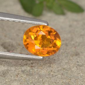 0.6ct Oval Facet Yellow Orange Clinohumite for sale thumb image of 0.6ct Oval Facet Yellow Orange Clinohumite (ID: 495207)