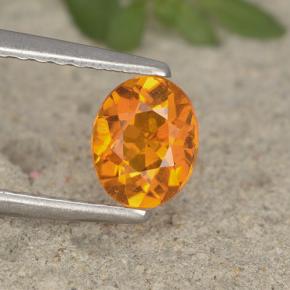 0.62 ct Orange Clinohumite Stone, Natural Clinohumite in Oval Facet Shape for Sale