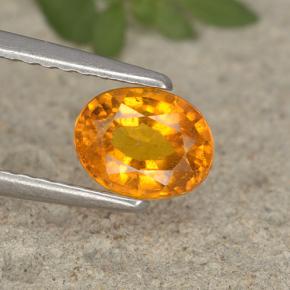 0.91 ct Orange Clinohumite Gemstone, Clinohumite Gem in Oval Facet Shape for Sale.