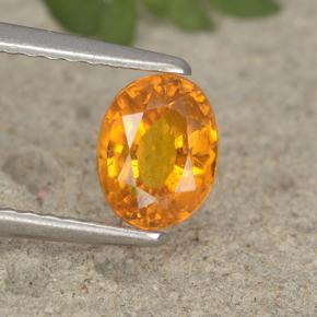 0.91 ct Orange Clinohumite Stone, Natural Clinohumite in Oval Facet Shape for Sale