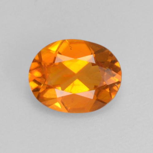 0.52 ct Orange Clinohumite Gemstone, Clinohumite Gem in Oval Facet Shape for Sale.