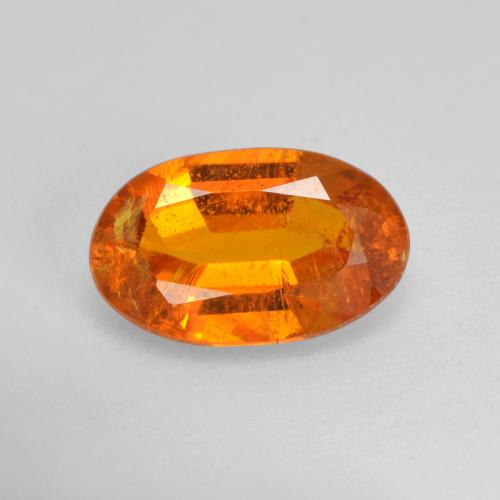 1.42 ct Orange Clinohumite Gemstone, Clinohumite Gem in Oval Facet Shape for Sale.