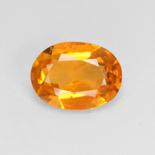 0.99 ct Orange Clinohumite Gemstone, Clinohumite Gem in Oval Facet Shape for Sale.