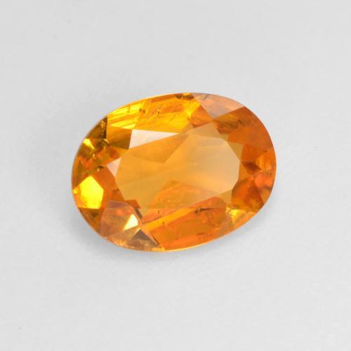 0.99 ct Orange Clinohumite Stone, Natural Clinohumite in Oval Facet Shape for Sale